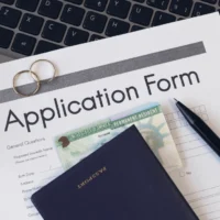 an-application-form-on-a-laptop-keyboard