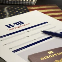 h1b-visa-application-concept-usa-h1b-visa-application-on-a-table-with-a-passport